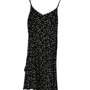 Summer flower print dress with adjustable straps and elastic back.